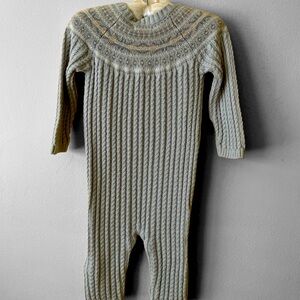 Welcome this beautifully crafted Tahari suit, with matching cap, for your baby!